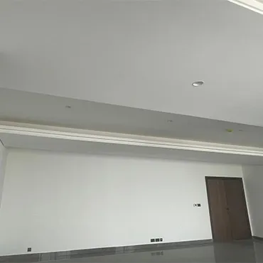 Finished interior walls and gypsum details representing LCC painting services